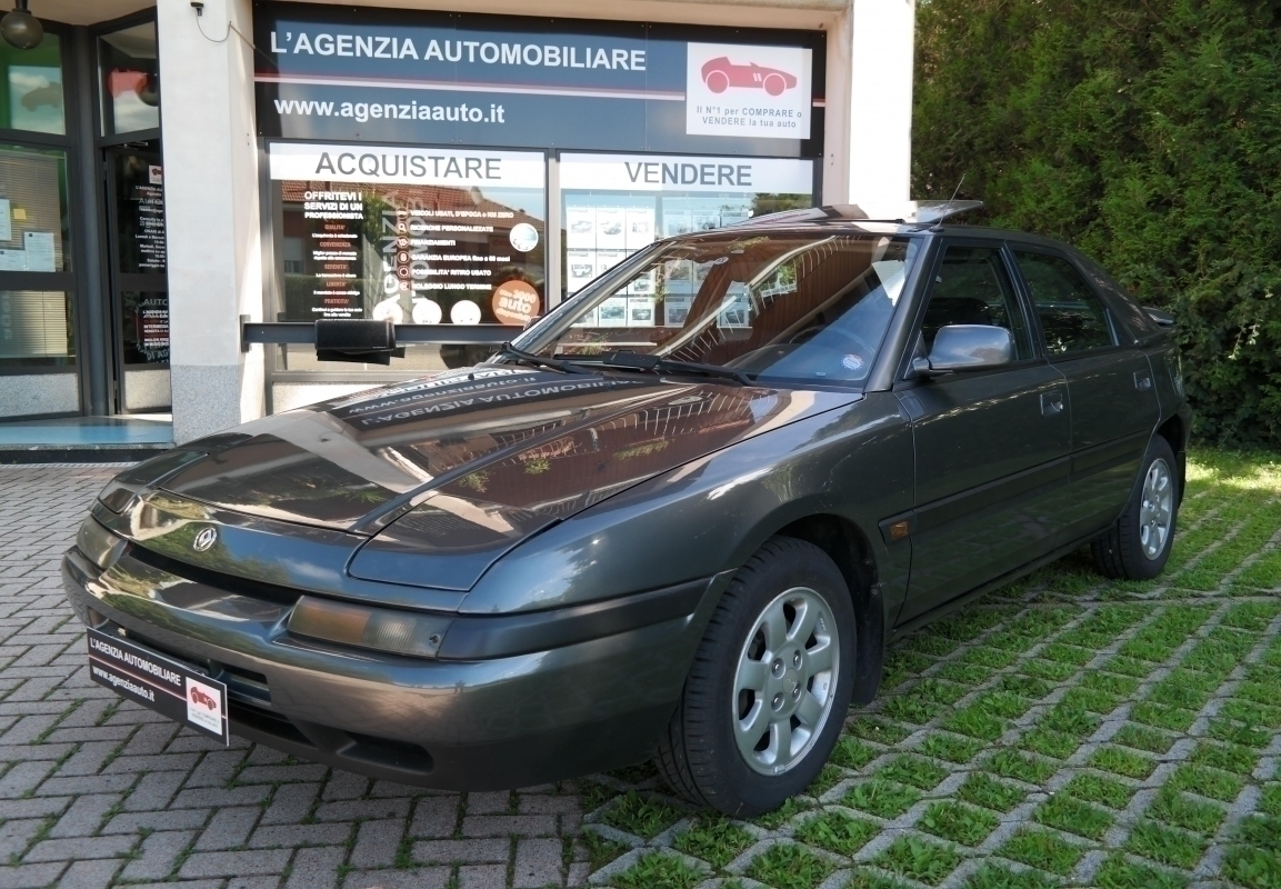 Mazda 323 — 4