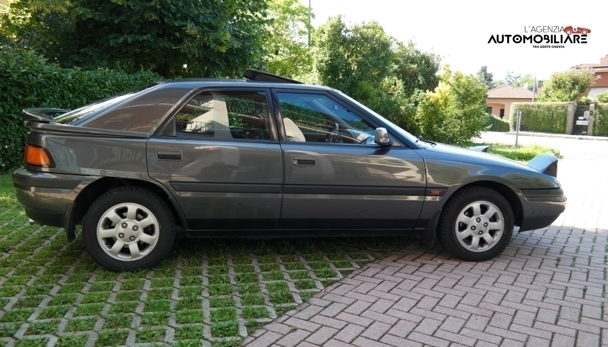 Mazda 323 — 14
