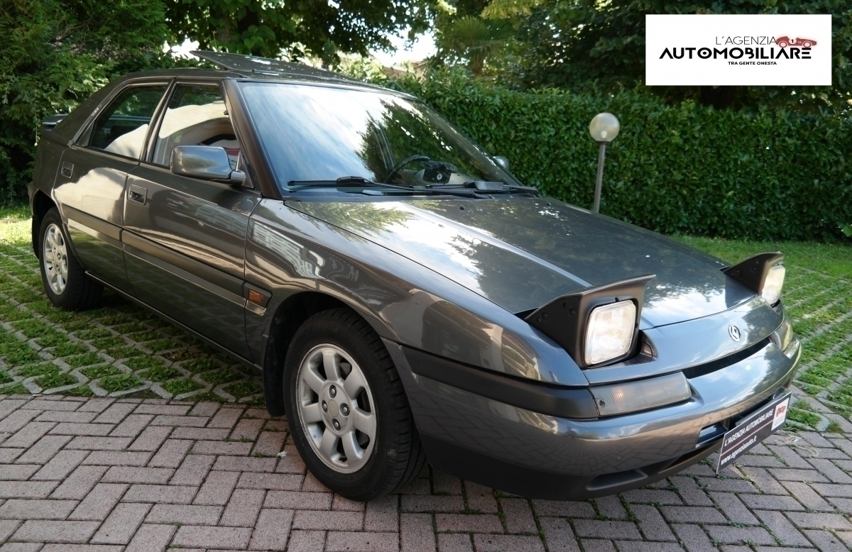 Mazda 323 — 15