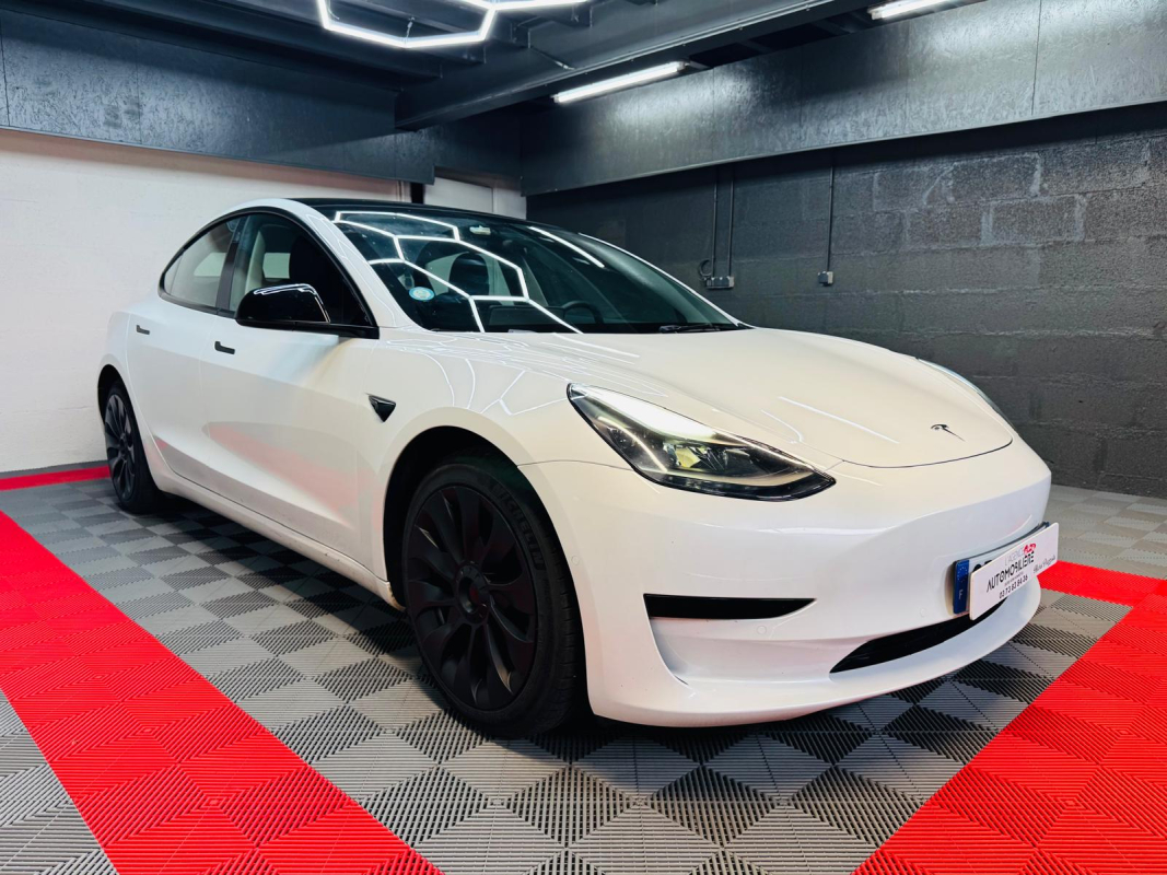 Tesla Model 3 — 3