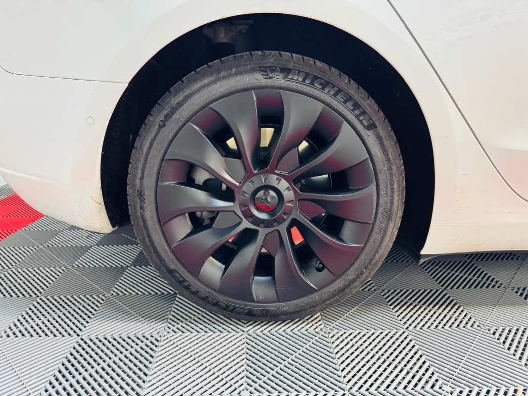 Tesla Model 3 — 24