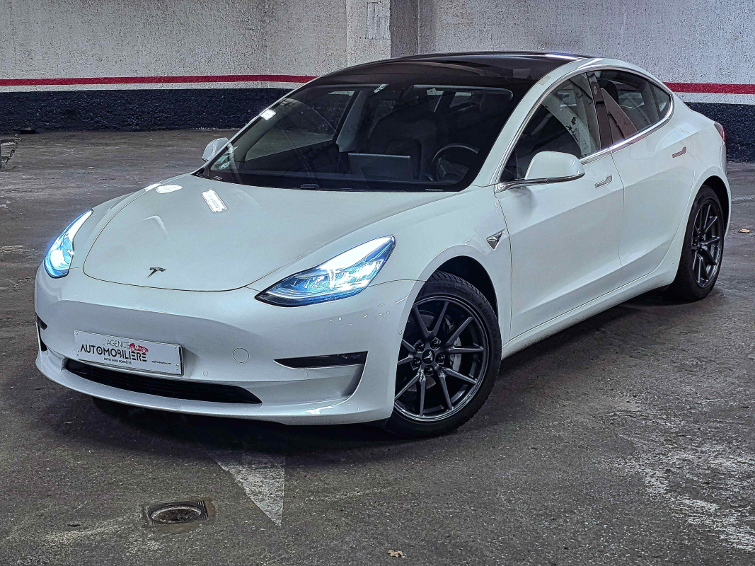 Tesla Model 3 — 3
