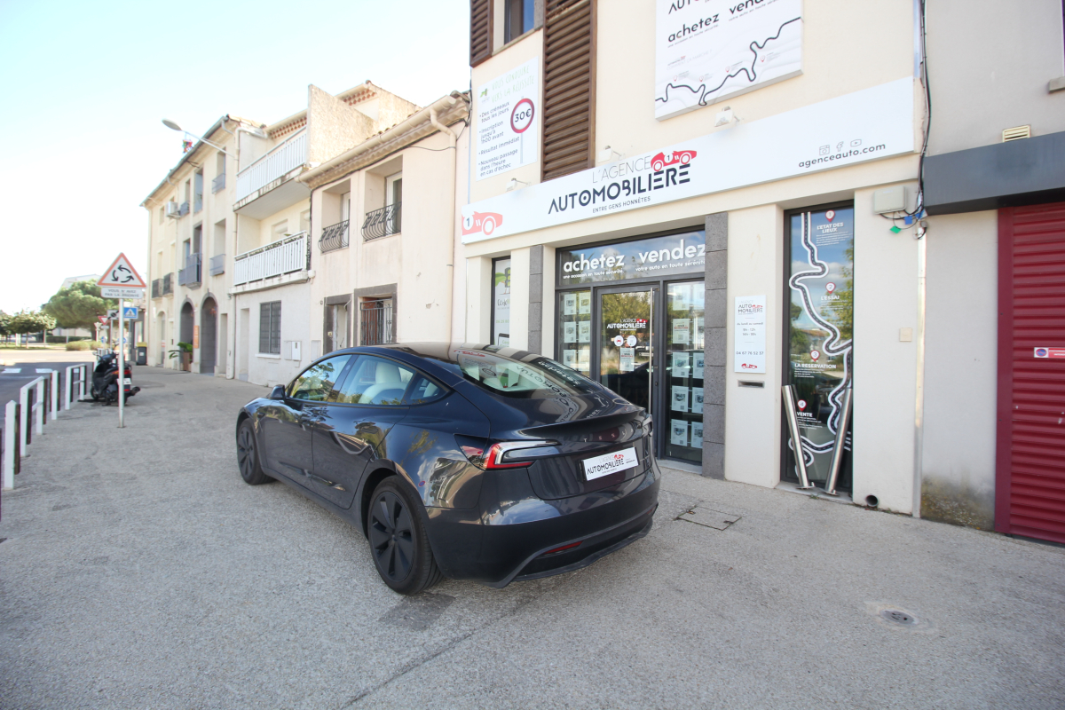 Tesla Model 3 — 3