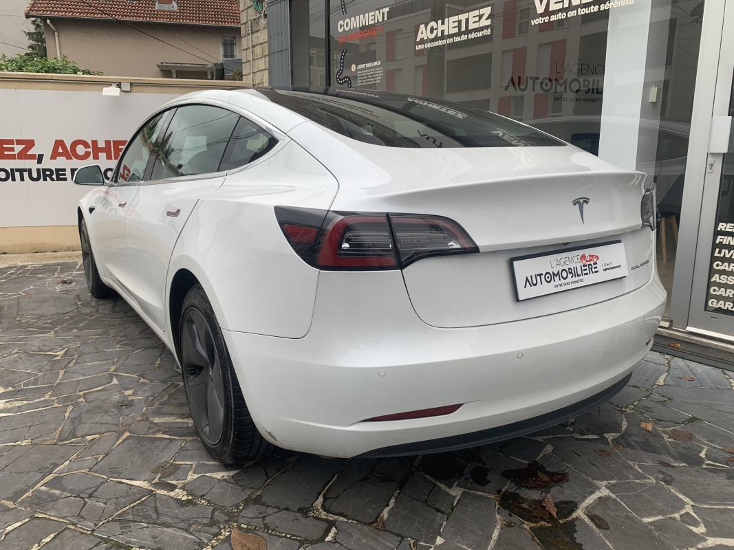 Tesla Model 3 — 3