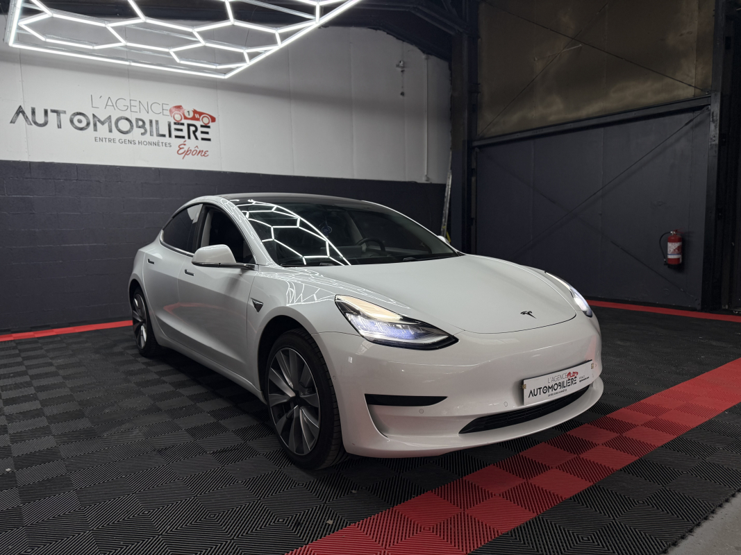 Tesla Model 3 — 3