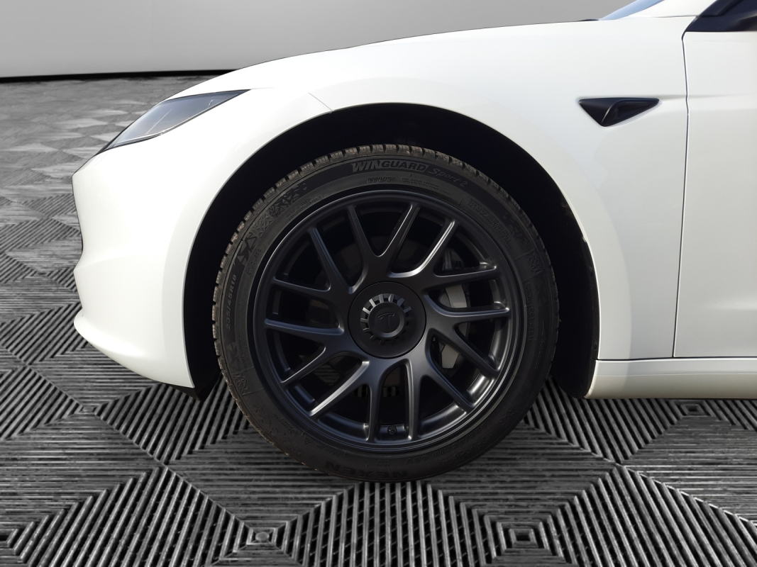 Tesla Model 3 — 35
