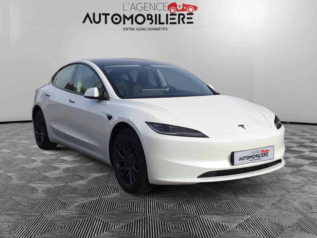 Tesla Model 3 — 3