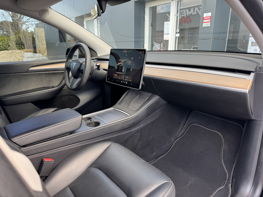 Tesla Model Y — 25