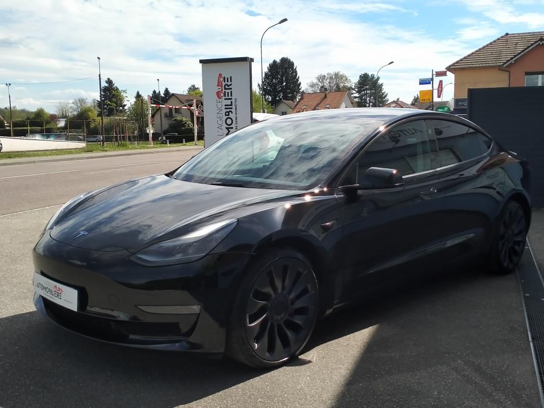Tesla Model 3 — 3