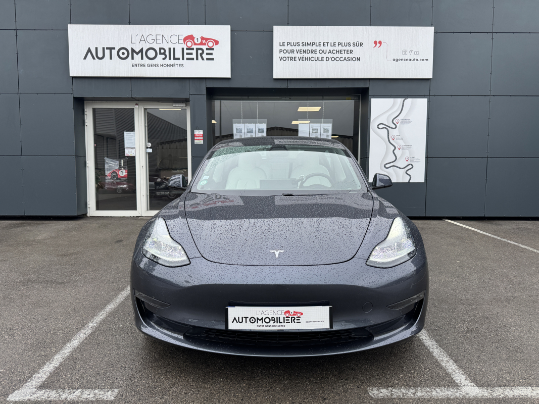 Tesla Model 3 — 3