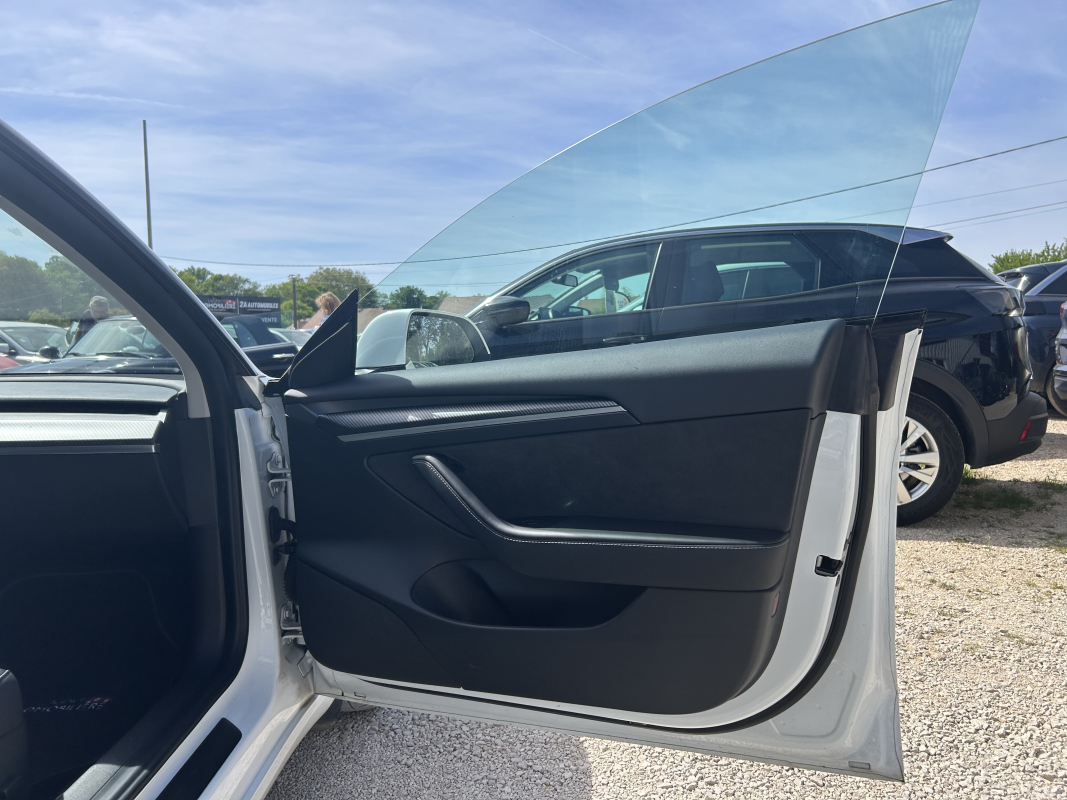 Tesla Model 3 — 32
