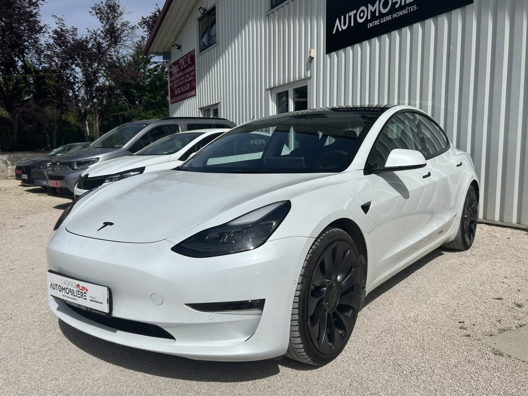 Tesla Model 3 — 3