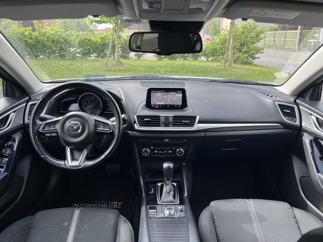 Mazda Mazda 3 — 18