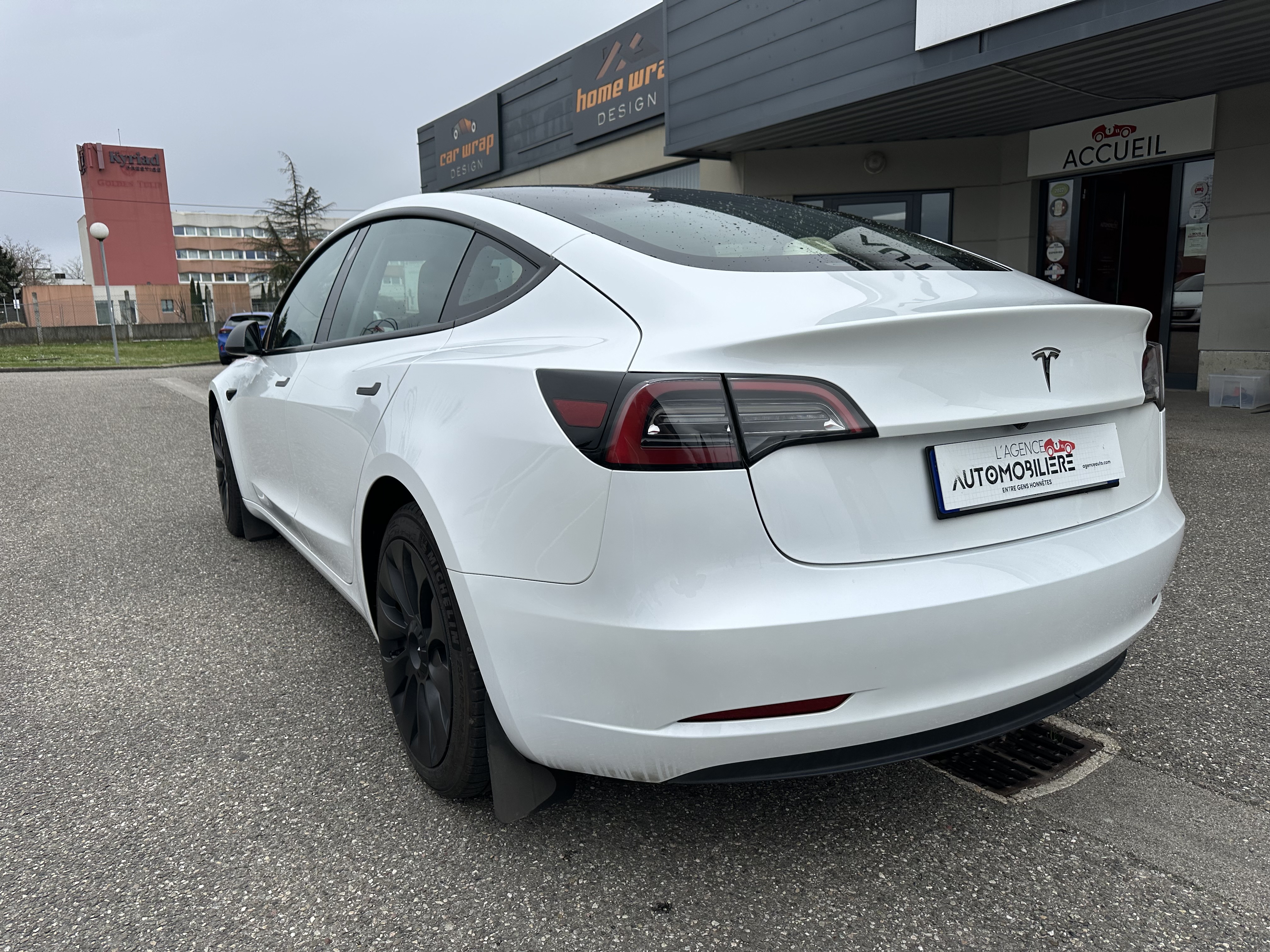 Tesla Model 3 — 3